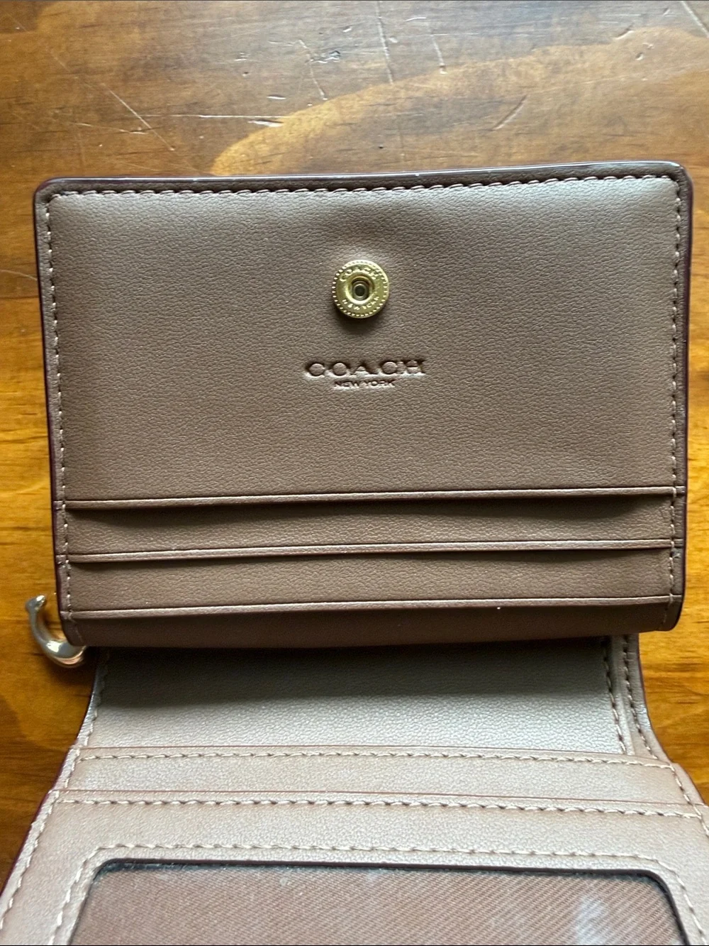 Coach excellent gold